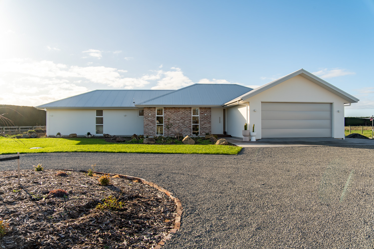Modern Rural home with bred brick and white plaster