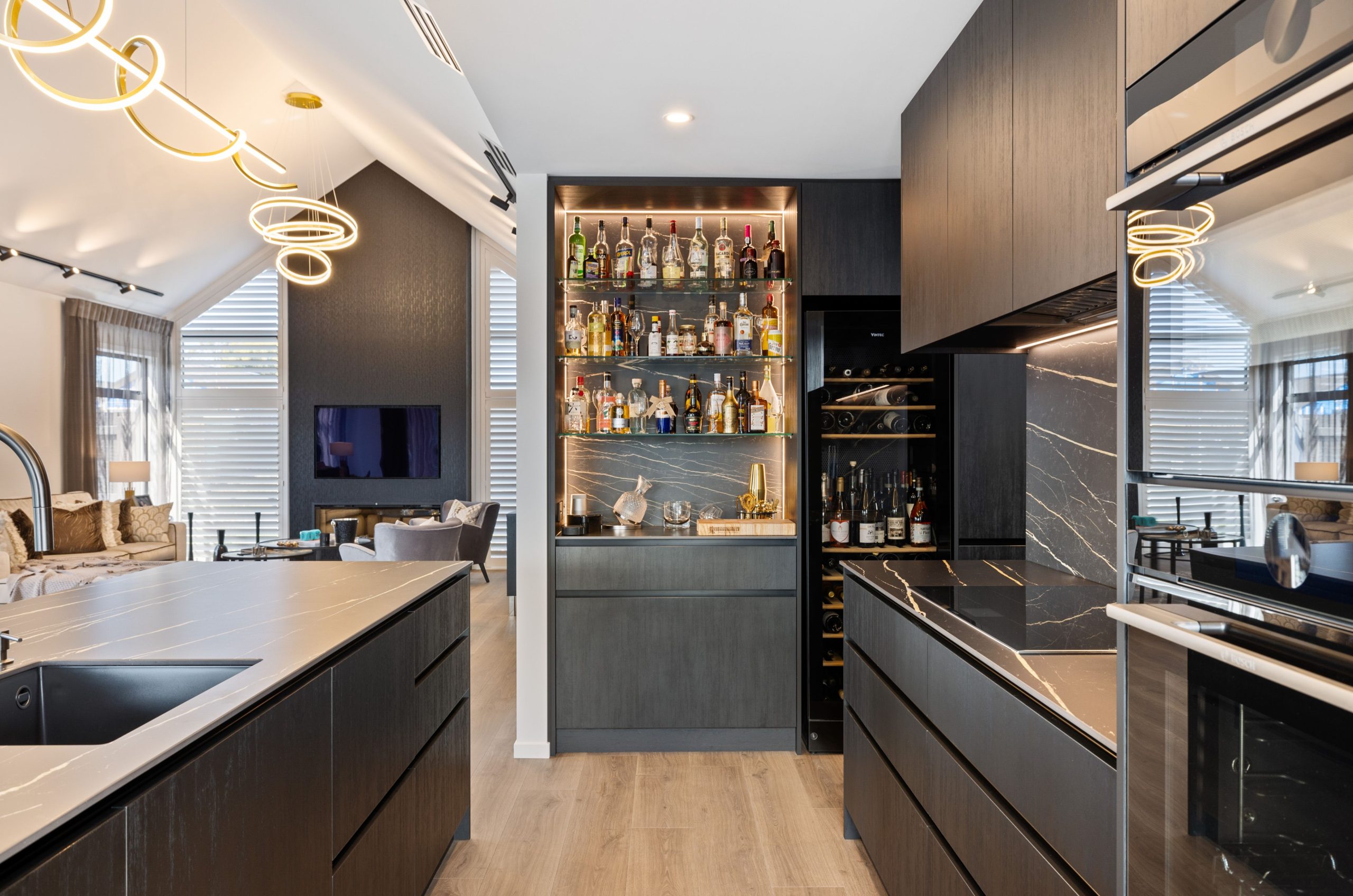 Designer Bar area, with feature LED lighting and black marble splashback