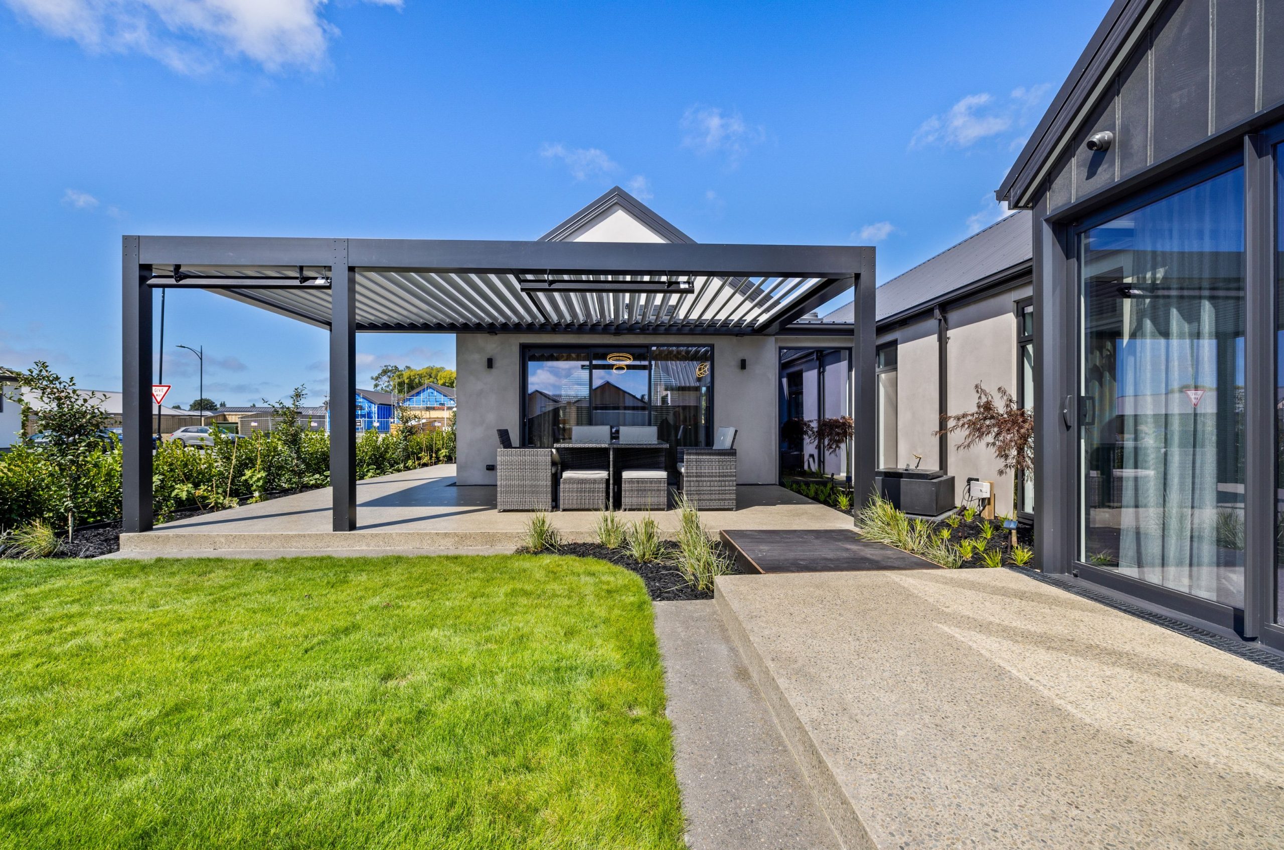 Covered outdoor living space ideal for entertaining year-round