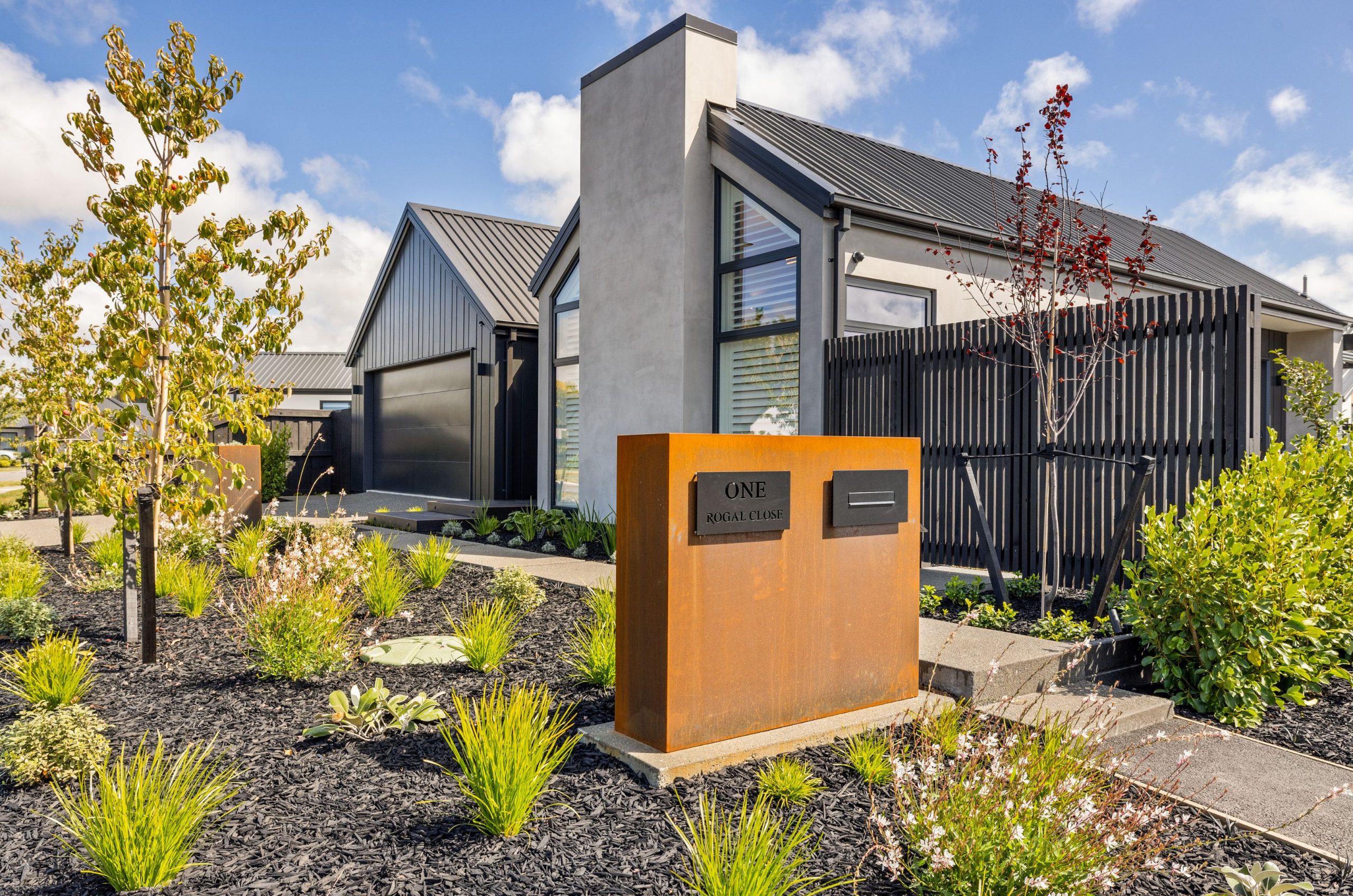 Contemporary Oakbridge home with gabled roofline and modern cladding