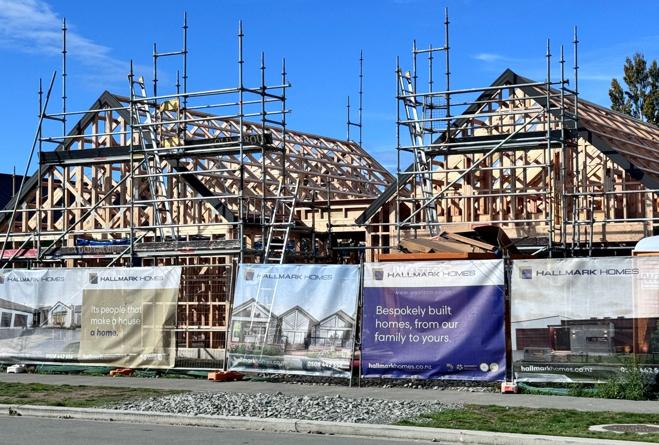 Modern custom-built home with brick and wood exterior, built by Hallmark Homes in Christchurch